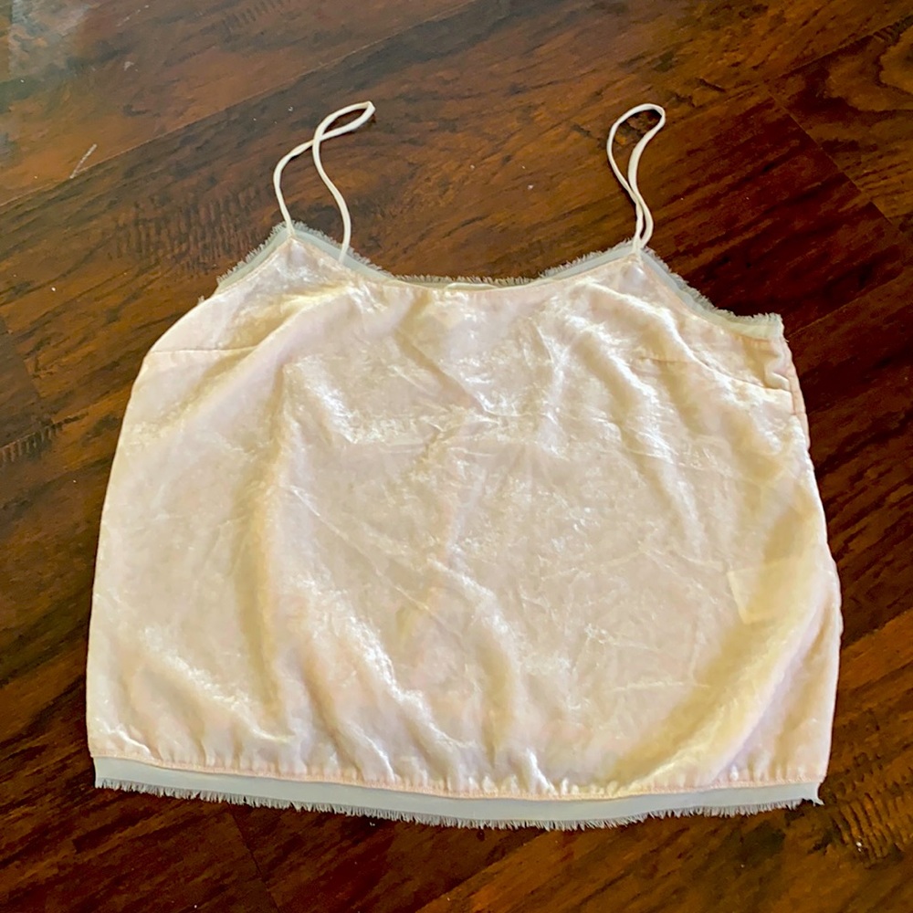 A cream cropped shirt